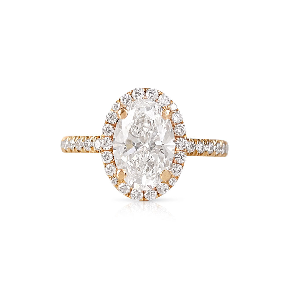 OVAL DIAMOND ENGAGEMENT RING HALO AND PAVE BAND