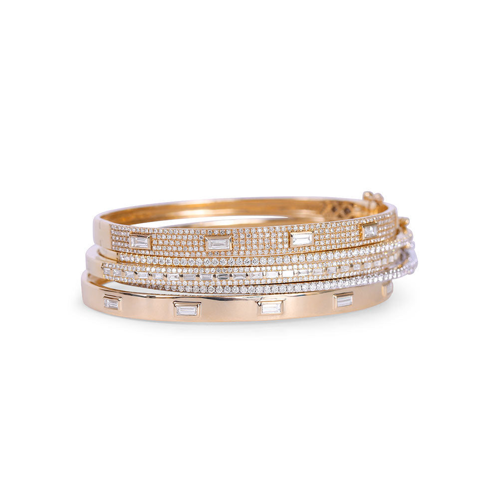 14K GOLD DIAMOND BANGLE WITH INSETBAGUETTE DIAMONDS