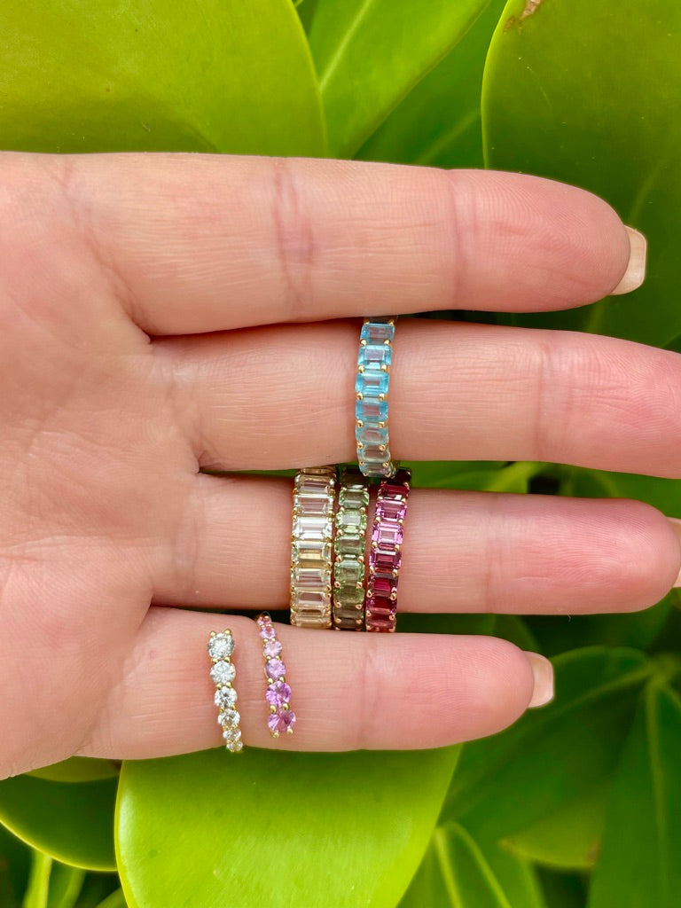 GRADUATED DIAMOND AND PINK SAPPHIRE OPEN WRAP RING