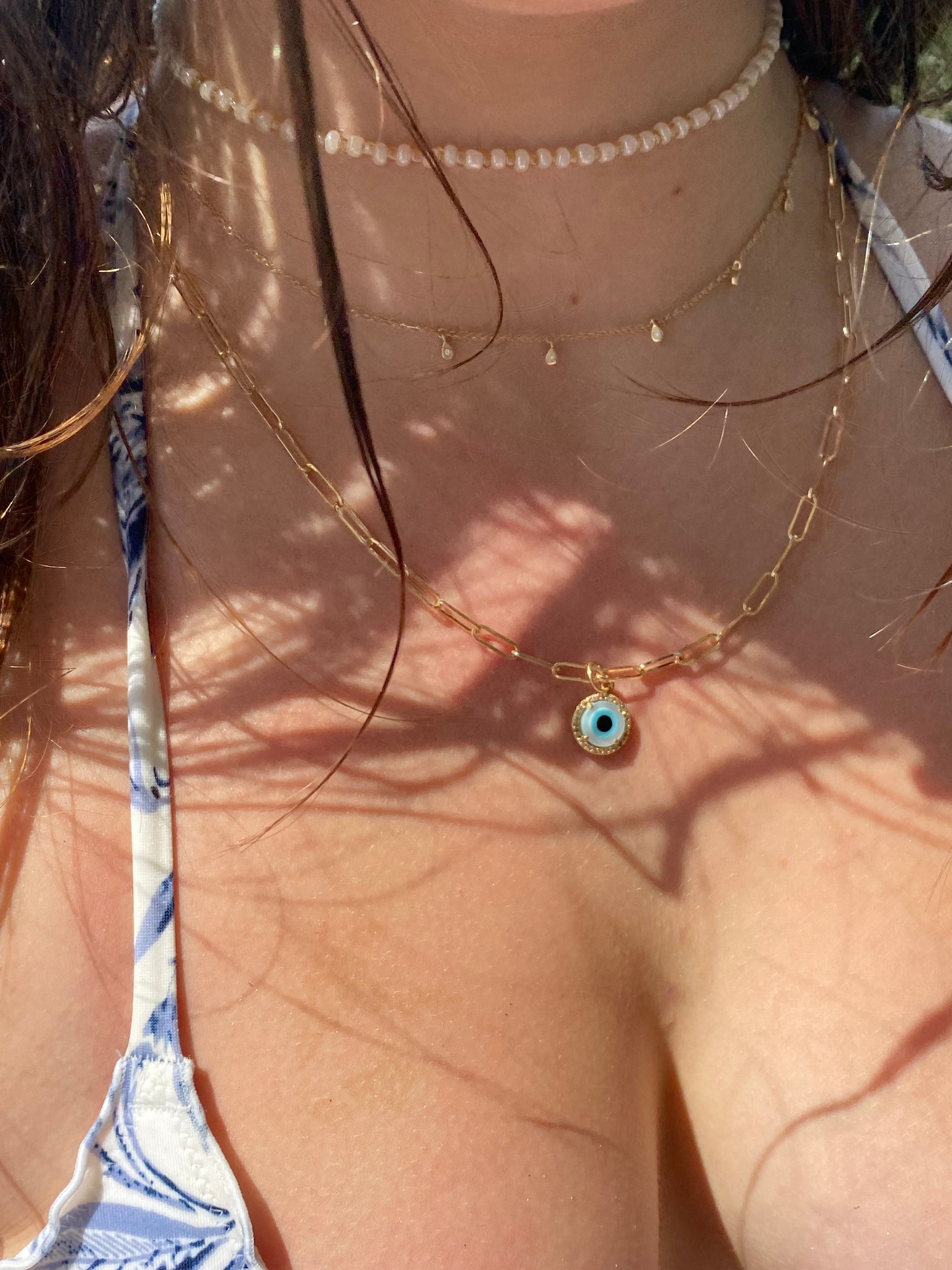 MINI MOTHER OF PEARL AND DIAMOND EVIL EYE CHARM