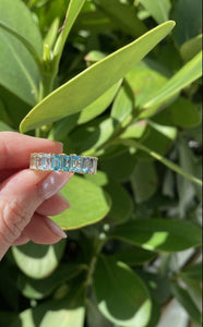 OMBRE EMERALD CUT TOPAZ ETERNITY BAND