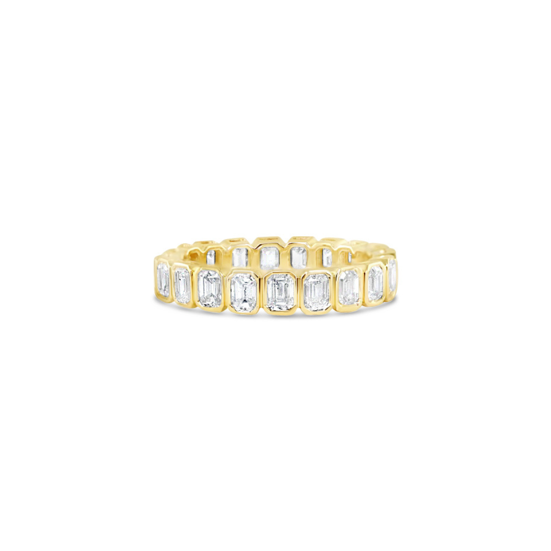 BEZEL SET EMERALD CUT DIAMOND ETERNITY BAND