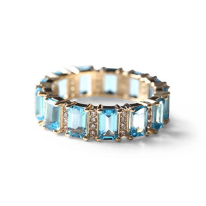 TOPAZ AND DIAMOND EMERALD CUT ETERNITY BAND 