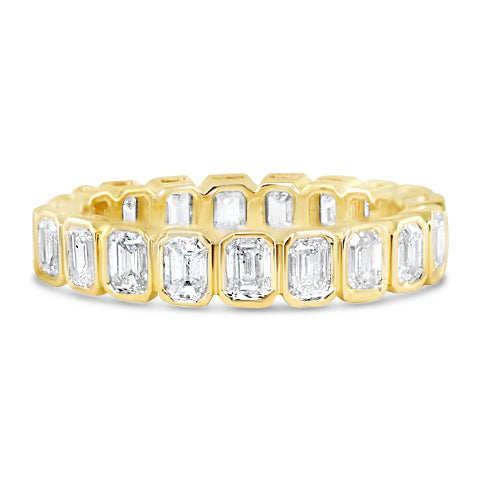 BEZEL SET EMERALD CUT DIAMOND ETERNITY BAND